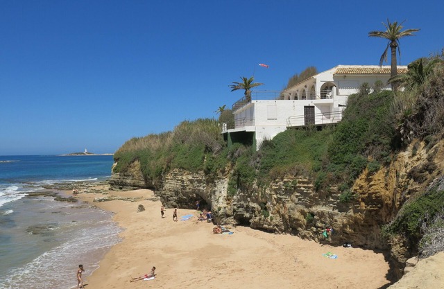 An air-conditioned villa, set in a large garden, on the first line of the beach