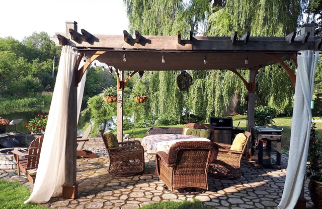 An enchanting island suite with Waterfalls~Hot Tub~Boats~Bikes~Patio~Parks Pass