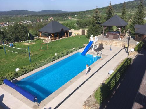 Apartamenty Pod Łysicą & SPA - przy stoku, basen, jacuzzi, sauna