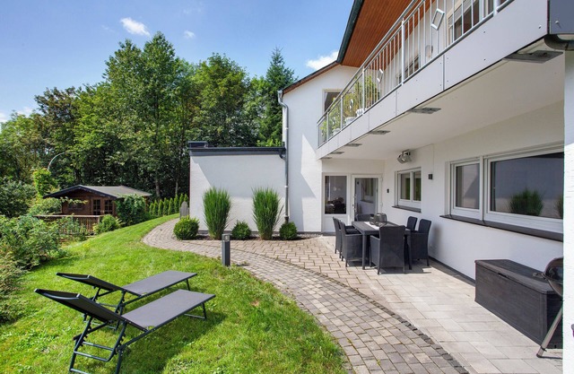 Apartment 'Am Wald' with Private Terrace, Shared Garden and Wi-Fi