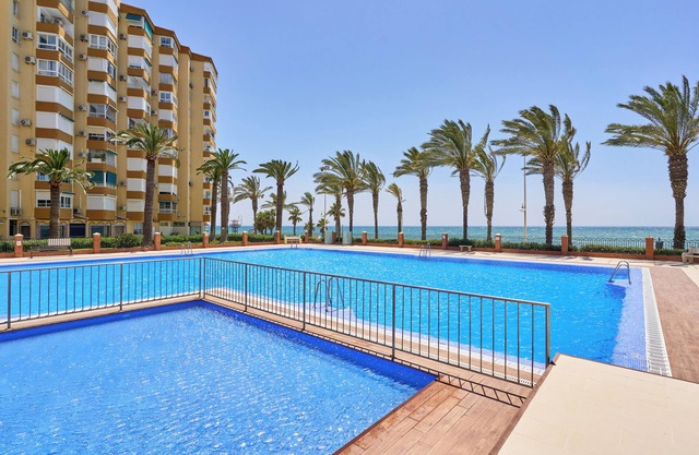 Apartment Directly on the Beach with Pool, Terrace, Sea View, AC, Tennis Court & Wi-Fi