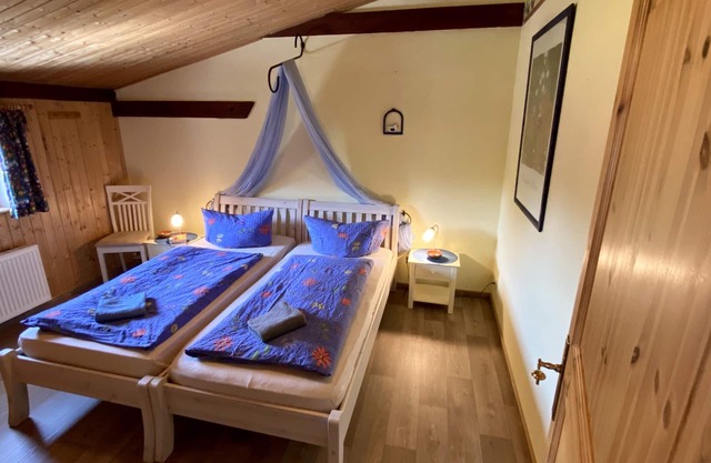 Apartment "Heuboden" cozy - wood-burning stove - great view of the countryside, sauna