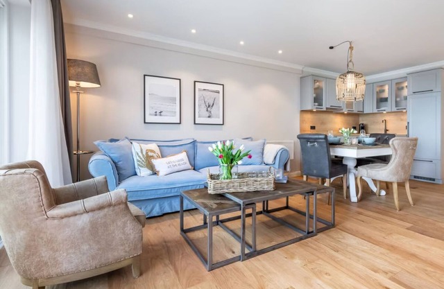 Apartment 'Wellness-Appartement Waterkant' with Sea View, Shared Garden and Wi-Fi