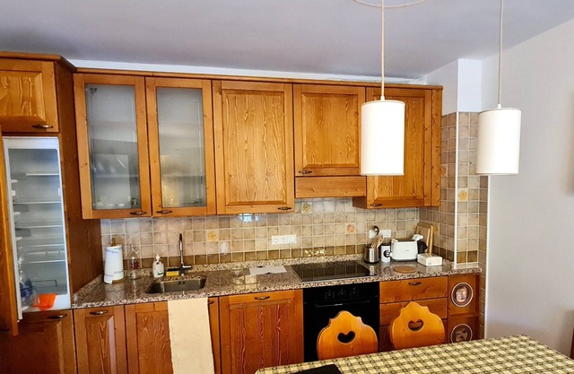 Apartment With Balcony and Mountain Views