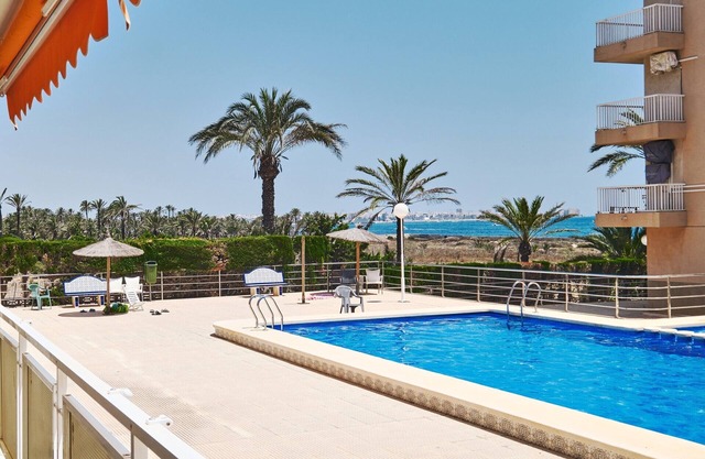 Apartment with 2 bedrooms, Wi-Fi, air conditioning, sea view, pool, and garage