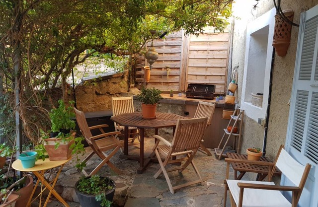 Apartment with terrace in the heart of a Corsican village 10 minutes from the beach