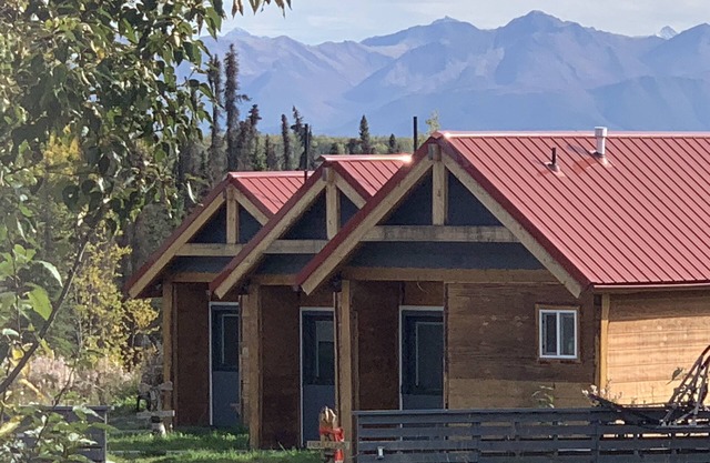Aurora Lights, Moose Cabin with mountain and woods view