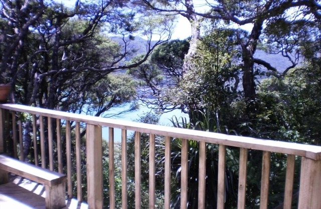 Bach in quiet bush setting with sea views