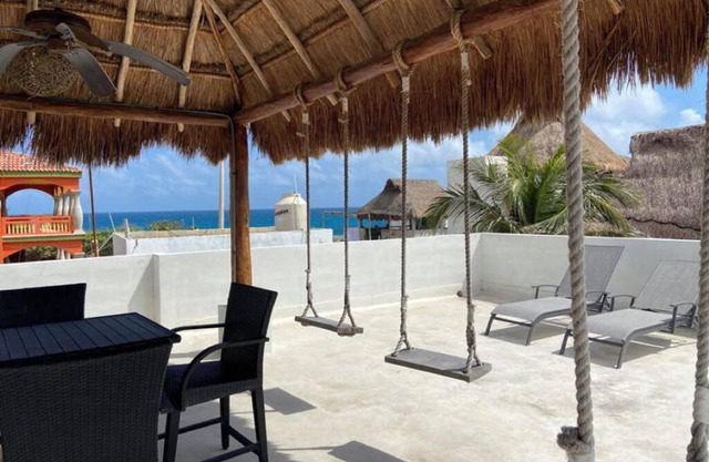Beach View Palapa with 2 Bedroom Penthouse Across from Isla Village