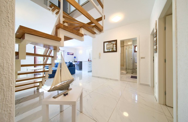 Beachfront Oasis Krk Island, Njivice Gem 150sqm apt with private beach access