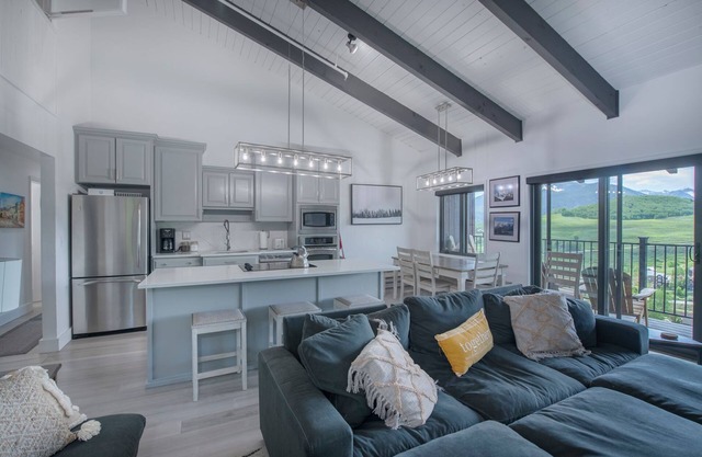 Beautiful 4 bedroom, top-floor unit with expansive great room and sunset views.