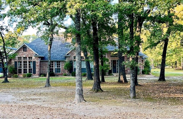 Beautiful Custom 4 bedroom pool home with 3 acres. Private spacious backyard.