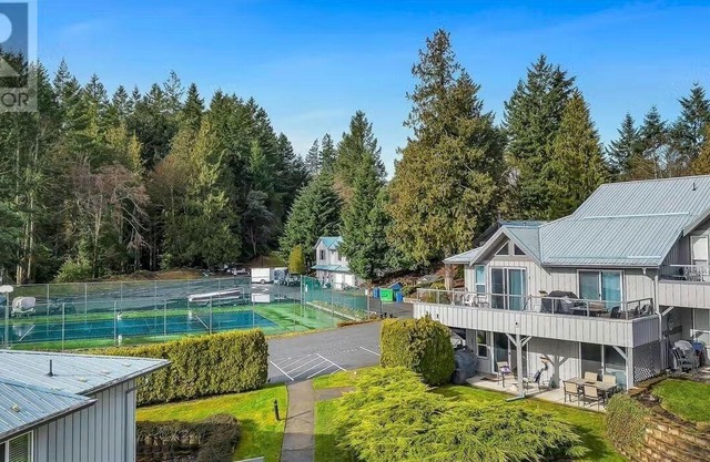 Beautiful lakefront condo and beach on charming Shawnigan Lake, BC Canada
