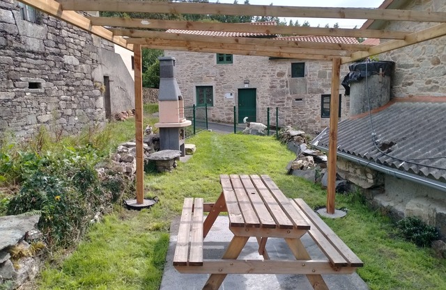 Beautiful restored two bedroom stone house in As Fragas