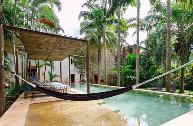 Beautiful Six Bedroom Tucked Away on the Lush Grounds