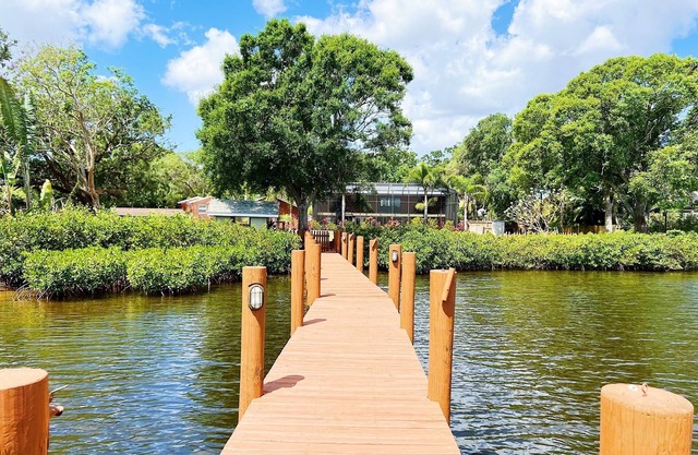 Beautiful Waterfront Home with Pool, Game Room, and Fire Pit