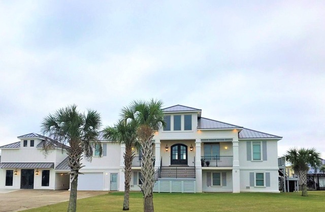 BEAUTIFUL WATERFRONT HOME WITH BOATHOUSE AND HUGE PORCHES!