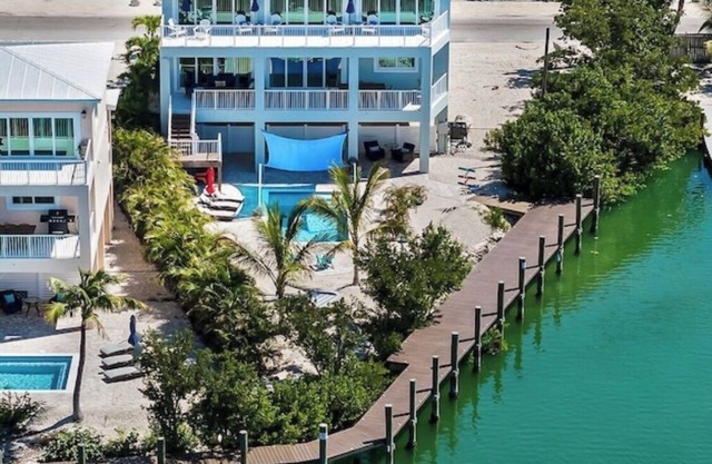 Brand New 5 bed/6bth Pool home w-115ft of dockage - available with 2 more homes