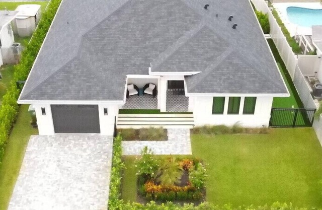 Brand New Luxury Tropical Villa with Pool, Dock & Minutes to Hard Rock + Beach + FLL + Downtown Ft Lauderdale