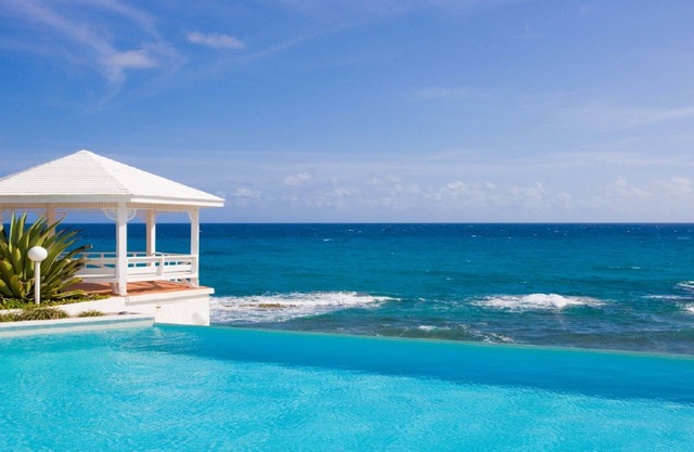 Breathtaking panoramic ocean view from stunning open, airy villa with huge pool