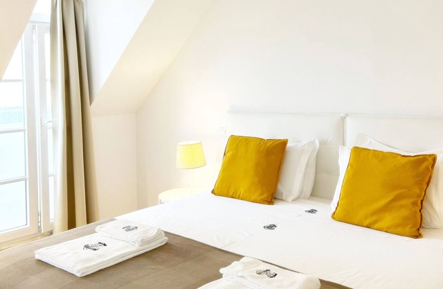 Bright and comfortable duplex apartment in a quiet and typical Lisbon neighborhood.