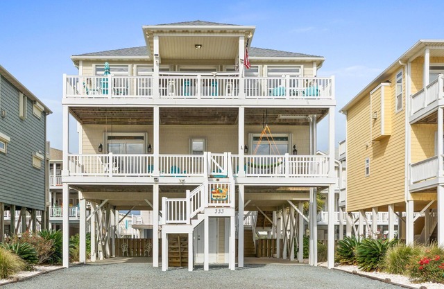 Bucket List OIB is a pristine 2nd row 5 bedroom, 5 bathroom beach home with a private pool and elevator and incredible views of the ocean