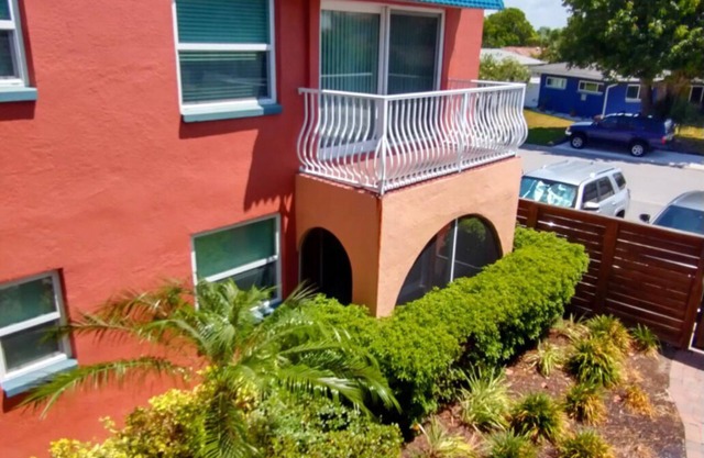 calming coastal condo walkway to beach.