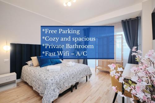 Camera con bagno privato, balcone, parcheggio gratis, 20 min dal Colosseo
