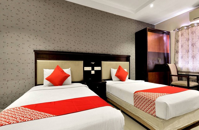 Capital O 12384 Hotel Rudra Grand