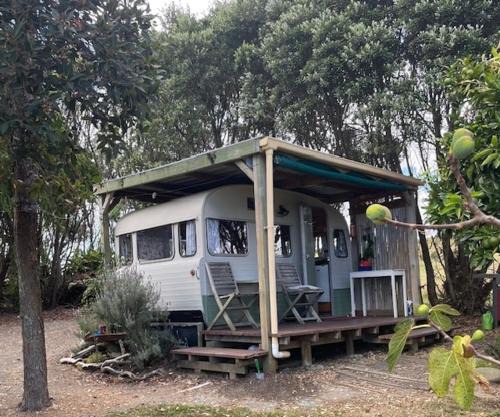 Caravan In The Orchard