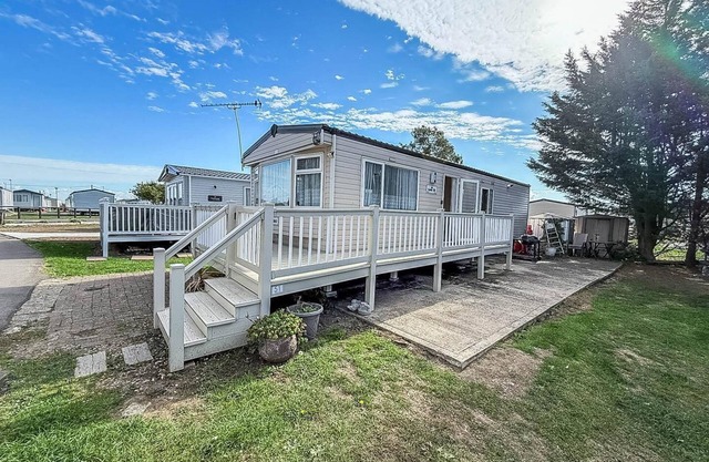 Caravan with decking & free WiFi at Steeple Bay ref 36051D
