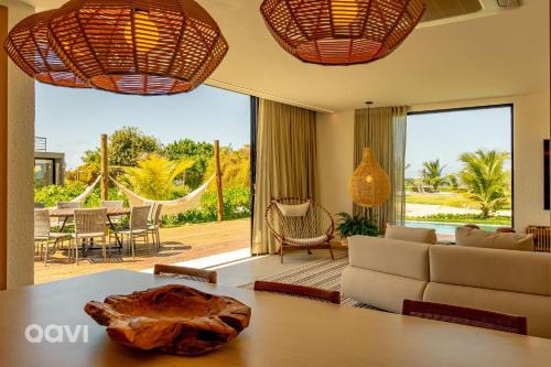 Casa com Piscina na Praia de Tatuamunha by Qavi