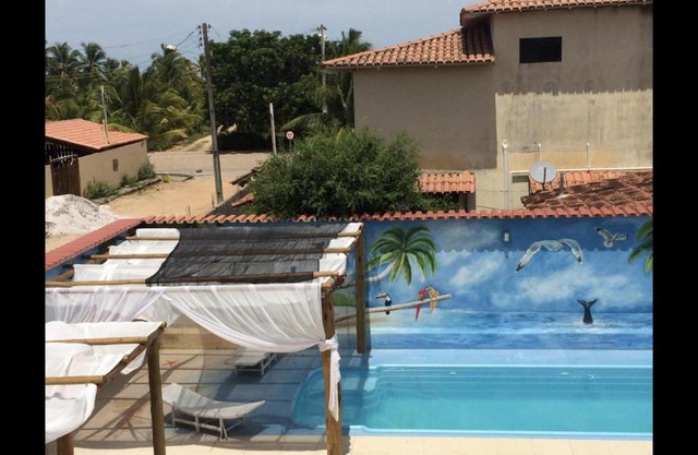 Casa Temporada Frente à Praia Piscina Ar cond Nova Viçosa VA