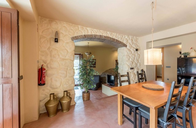 Casa Terra is nestled on the edge of an olive farm with a swimming pool