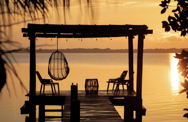 Casa Xchel in front of the bay, pool, jacuzzi and deck.
