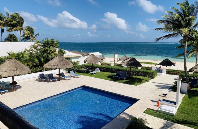 Casita Blanca gem overlooking a gorgeous pool and the Caribbean Sea!