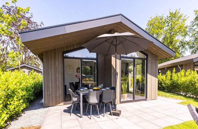 Chalet by Pond with Sauna