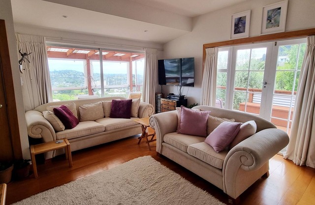 Character & Comfort in Art-filled home with Views