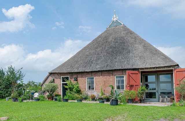 Characteristic headlong hull farm with thatched cover