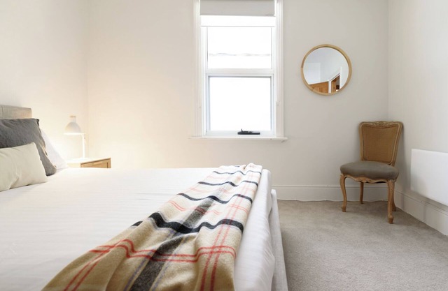 Charming 3-Bedroom Home with Sunroom & Parking