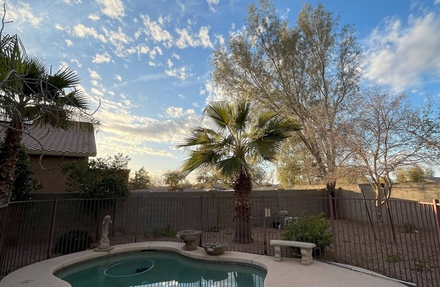 Charming 4-Bedroom Oasis in Maricopa, Arizona with Pool, Garden & Pool Table!