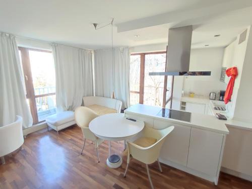 Charming Apartment with a Tranquil Balcony Garden View