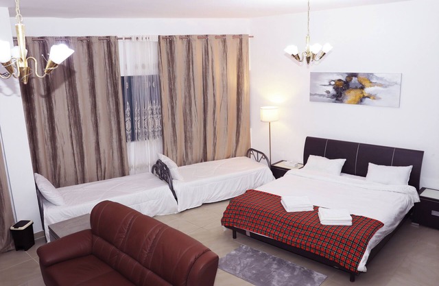 Charming home away from your home with WiFi, fitness room in lovely Sharjah.