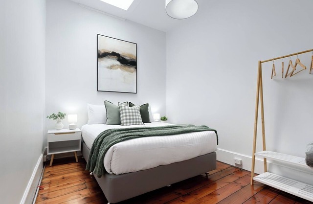 Charming Townhouse Steps Away from Shops