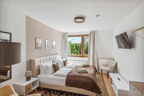 Charysma - Weserufer, stylish, Schlafzimmer mit Smart-TV, 2 Parkplätze