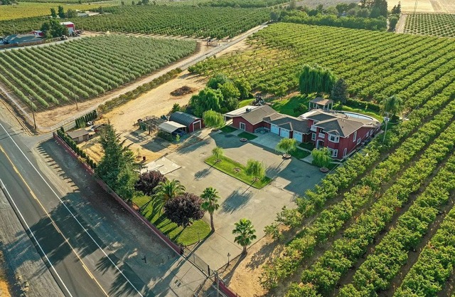 Cherry-tree-lined country escape with a pool