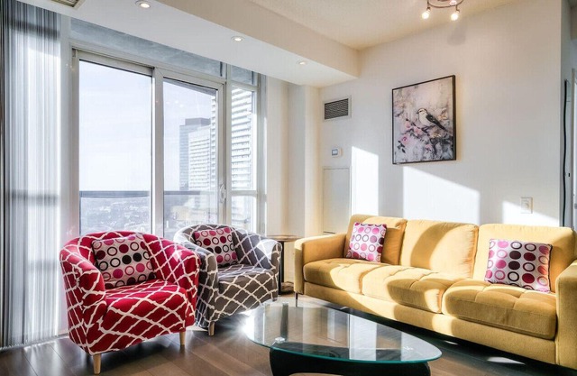Chic 2BR Condo w/City Views, Balcony & WiFi