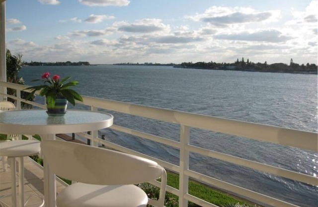CLUB BAHIA LUXURY WATERFRONT Condo View Sunsets, Dolphins, Manatee from balcony!
