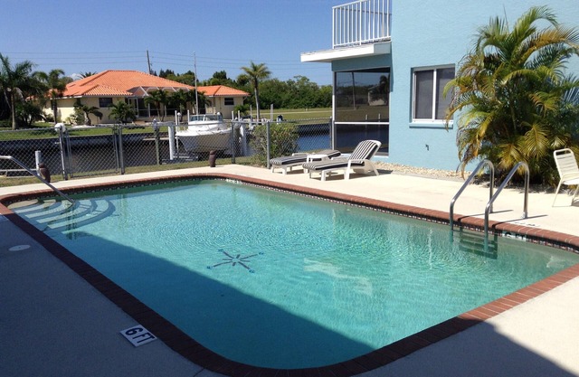 Come Home to Paradise in Punta Gorda Isles. Waterfront Dock Heated Pool Quiet