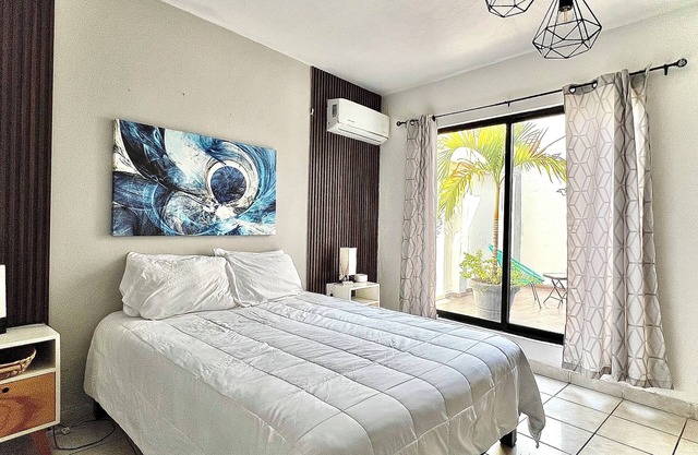 Comfortable modern apartment conveniently located for shopping and dining.